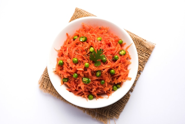 Carrot raita, Gajar Koshimbir. It a condiment from the Indian subcontinent, made with or without dahi or curd together with raw or cooked vegetables Gajar or Carrot, green, peas, chilli, coriander