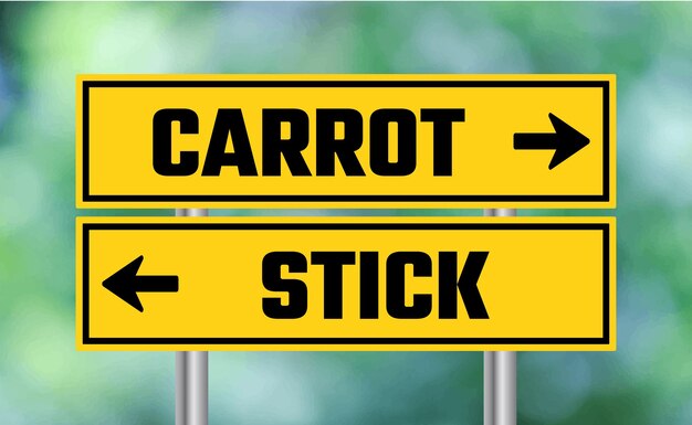 Photo carrot or stick road sign on blur background