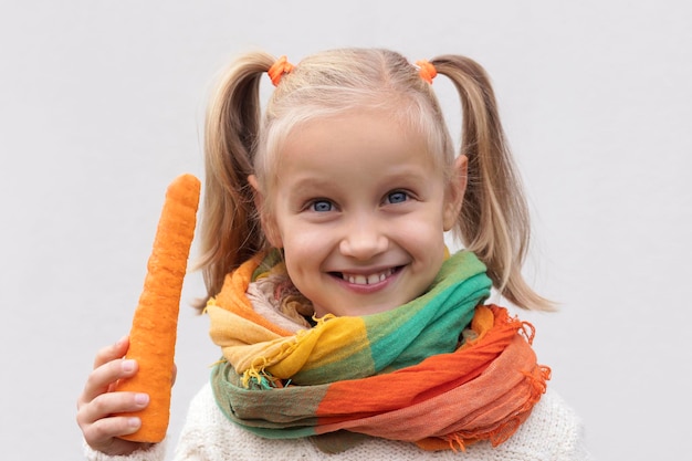 Carrot Vegetables for Children. Healthy Fresh Bio Food for Kids. Child Holding Orange Organic Carrot