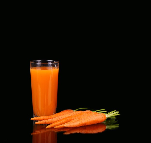 Carrots and juice in a glass