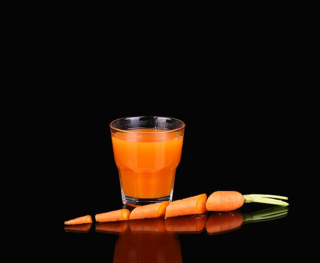 Carrots and juice in a glass