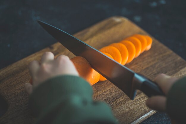 Photo carrots on the kitchen table before cooking. homemade healthy food, vegetarian and homemade recipes