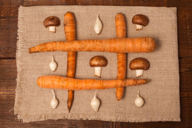 Carrotsonions and mushrooms are in tictactoe composition