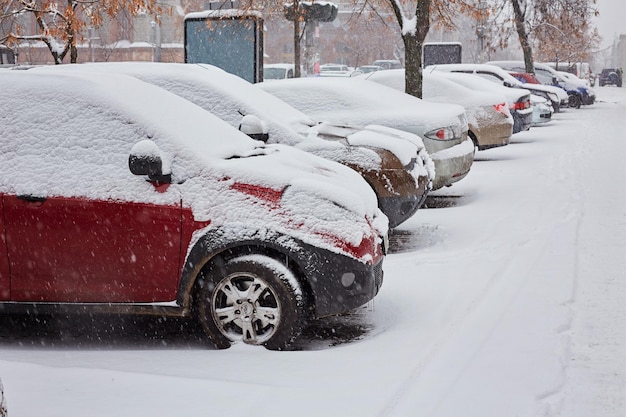 Cars are covered with snow in wintertime