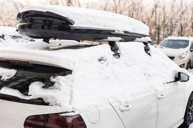 Photo cars covered with snow, car windows in the snow