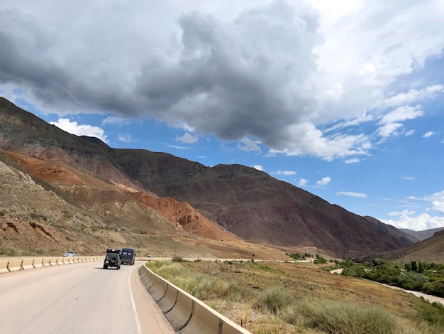 The cars on the highway in Kyrgyzstan