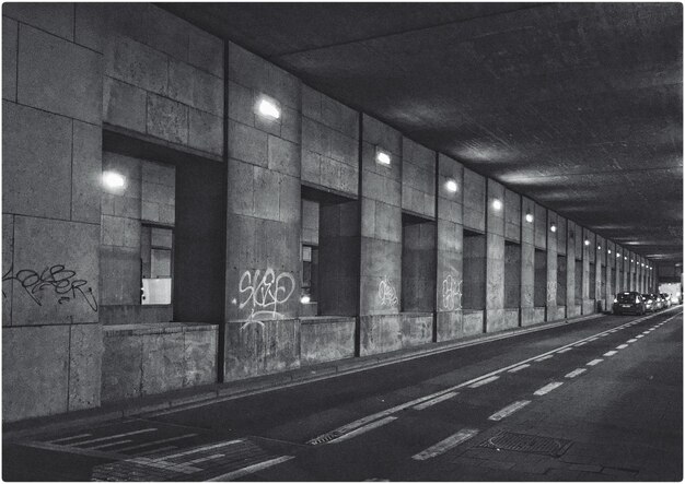 Cars at illuminated parking lot