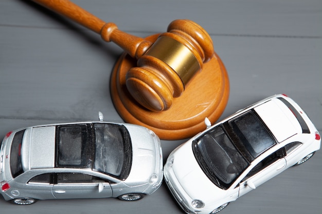 Cars and the judges hammer. concept litigation after accident