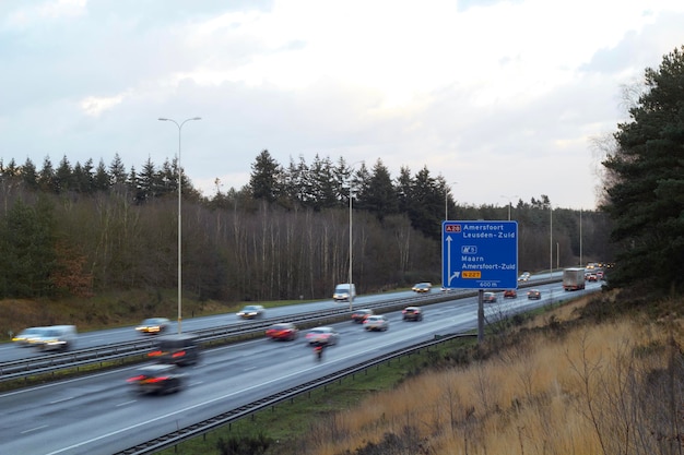 Cars on road against sky