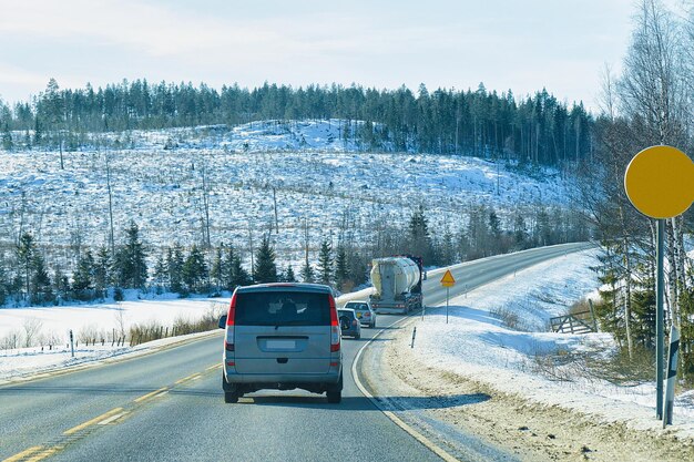 Cars and truck in the road in winter Rovaniemi, in Lapland, Finland