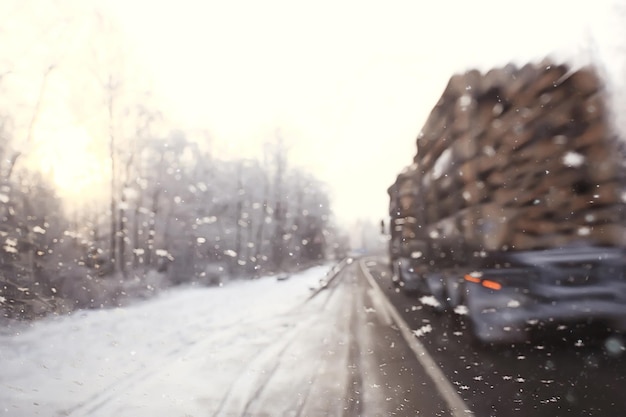 cars on winter road traffic jam city / winter weather on the city highway, the view from car in the fog and snow road