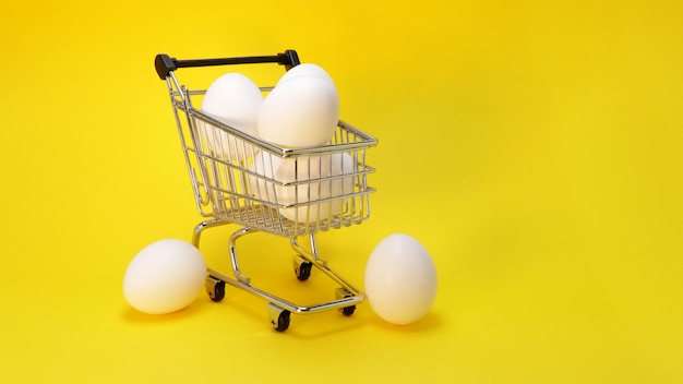 Cart from the supermarket with chicken eggs