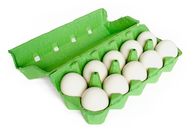 Carton box with eggs isolated on the white background