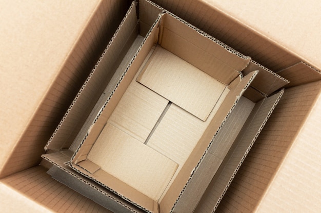 Photo carton, cardboard packages inside a paper box