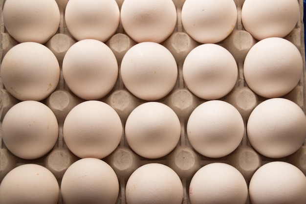 Photo a carton of a eggs raw