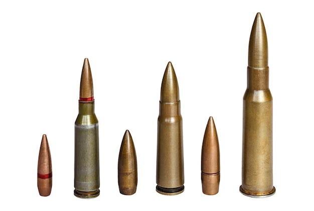 Cartridges and bullet of assault rifle and machinegun of 762 caliber on white surface