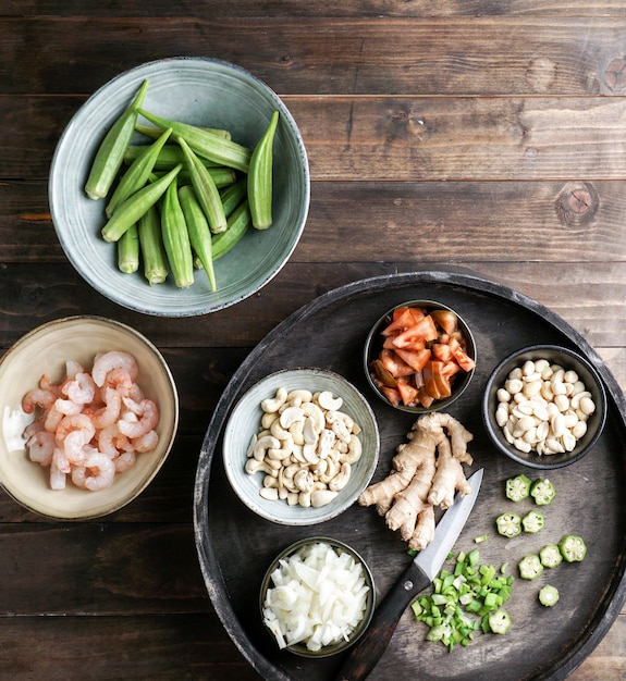 Caruru Ingredientes, traditional Afro-Brazilian dish made with okra and dried shrimp, tomatoes., cashews and peanuts