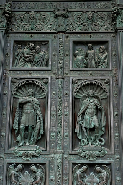 Carved door of the saint isaac\'s cathedral, st. isaac\'s square,\
st. petersburg, russia