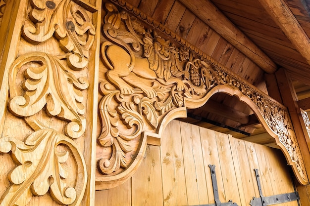 Carved window decoration ornamental patterns on old house Gorodets Russia