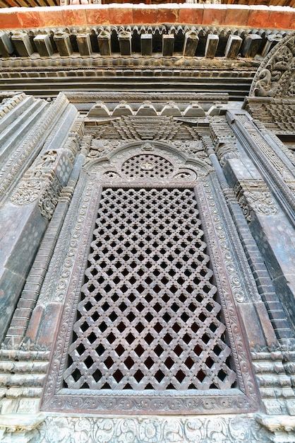 Carved wooden entrance to a public Hindu temple Kathmandu Nepal