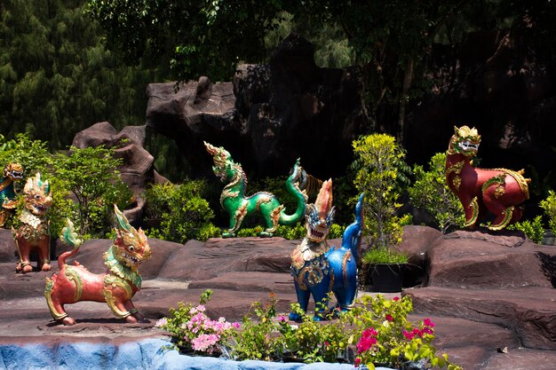 Carving sculpture art of legend creatures mythical himmapan animal in Himavanta legendary forest for thai people and foreign travelers travel visit at Wat Don Khanak temple in Nakhon Pathom Thailand