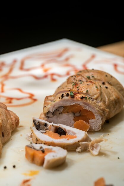 Carving of stuffed chicken breast