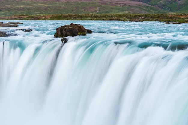 Cascade of the Godafoss Waterfall in Iceland