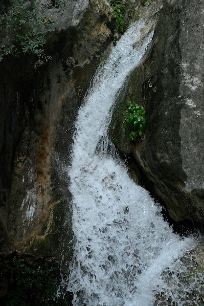 Cascade of water in the cave of the water of the tiscar river granada