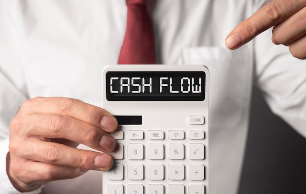 Cash flow word on calculator, cashflow inscription.