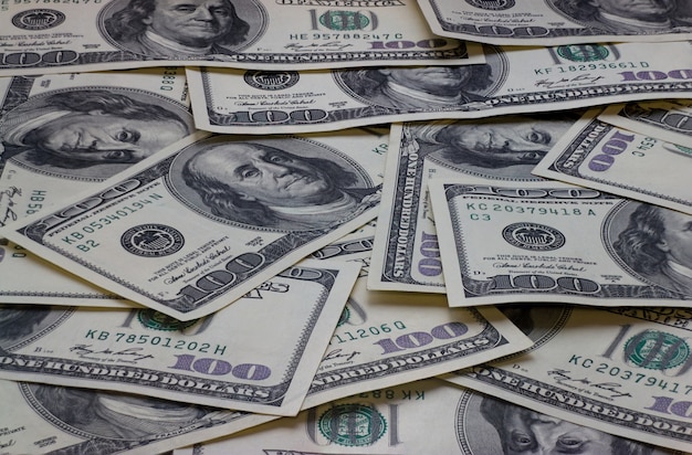 Foto contanti di banconote da cento dollari, immagine di sfondo del dollaro ad alta risoluzione