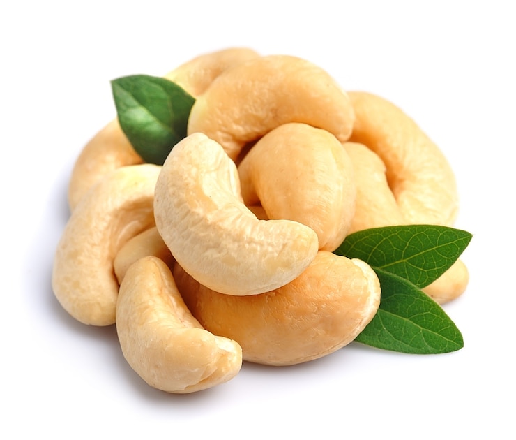 Photo cashew nut closeup on white isolated.