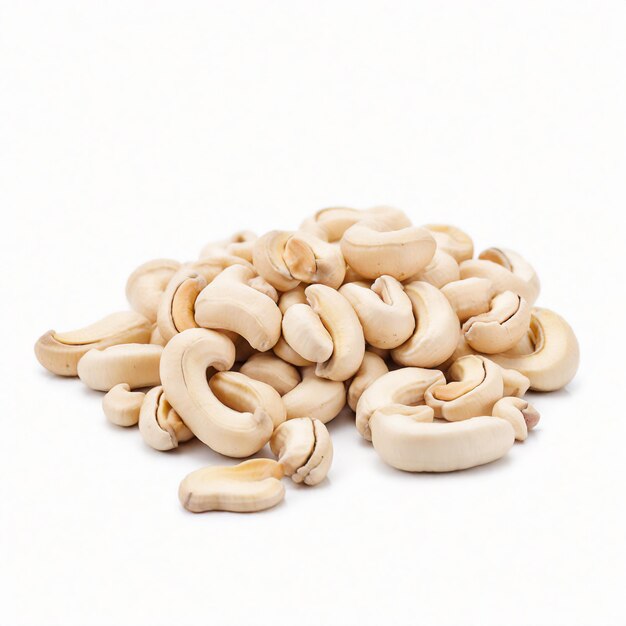 Cashew nuts arranged on white