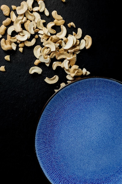 Cashew nuts in blue plate