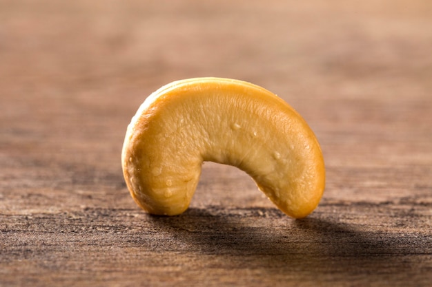 cashew nuts close up on wood background