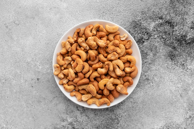 Cashewnoten close-up. Ontbijt, gezonde voeding. Het kan als achtergrond worden gebruikt