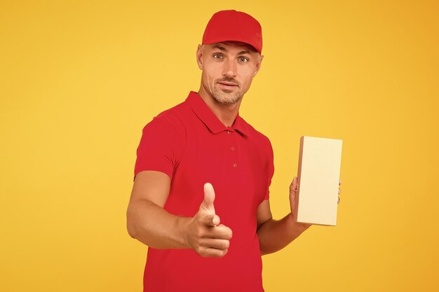 Cashier shop staff black friday express delivery courier parcel\
post package targeted delivery services freight transportation\
perfect delivery delivery man yellow background free services