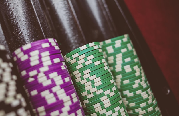 Photo casino colorful poker chips lie on the game table in the stack vintage photo processing