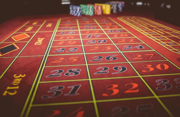 Photo casino colorful poker chips lie on the game table in the stack vintage photo processing