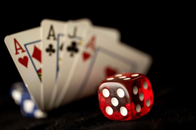 casino night playing cards and dice on dark background