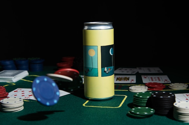 Photo casino playing cards and chips beer on a green table