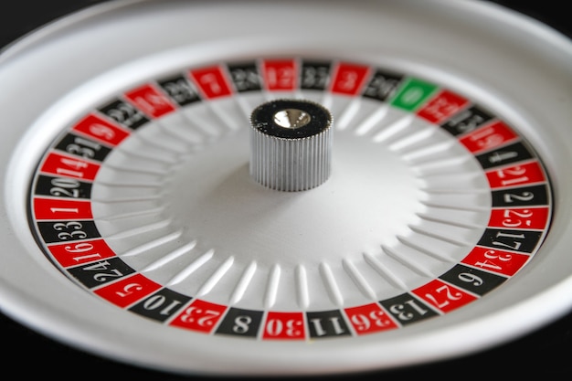 Casino roulette wheel close up view.