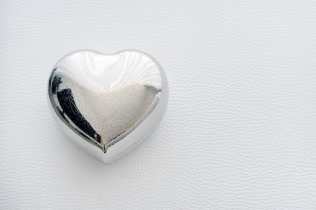 Casket shaped heart of iron. Card for valentines day with text happy valentines day.