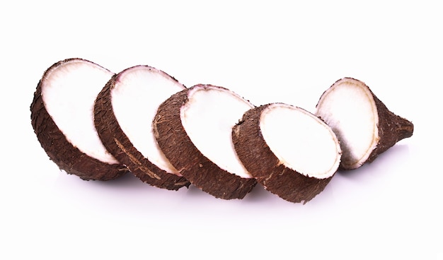 Cassava root on white background