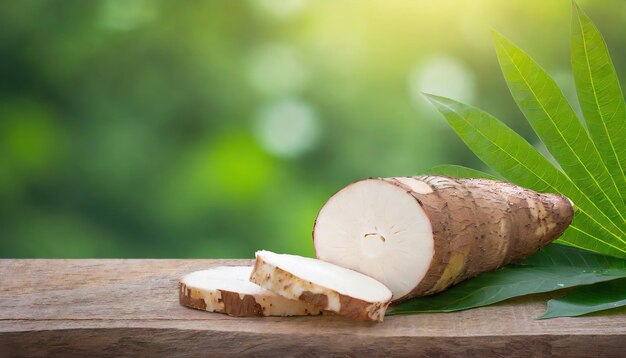 Cassava on wood with a blurred green background