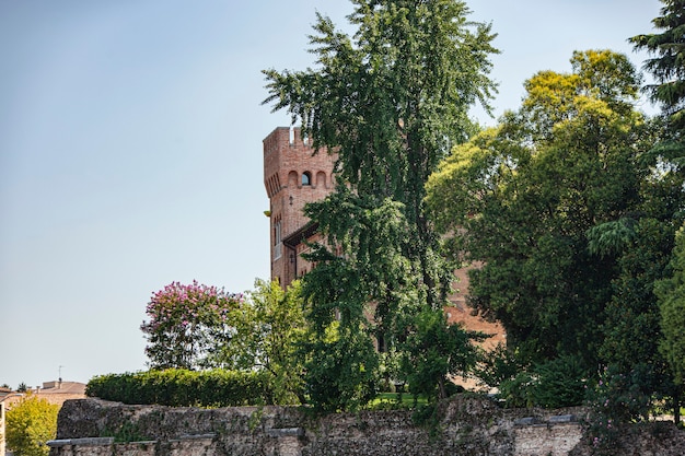 Castle of the city of Treviso in Italy filtered by the trees that surround it