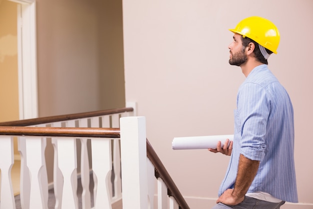 Casual architect walking up the stairs