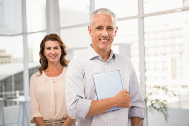 Casual business colleagues smiling at camera