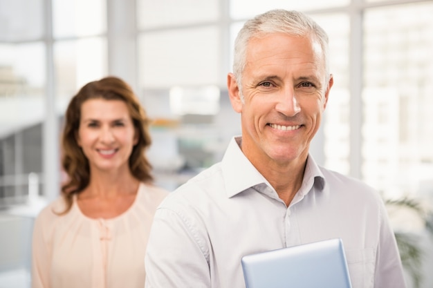 Casual business colleagues smiling at camera