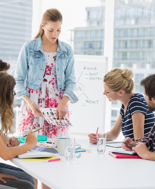 Casual business people in office at presentation