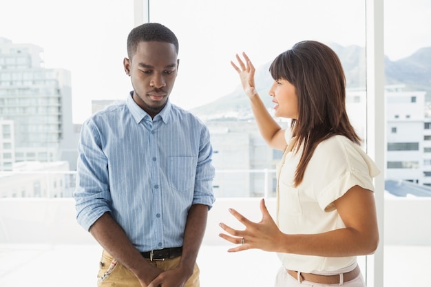 Casual business teamwork having an argument in the office